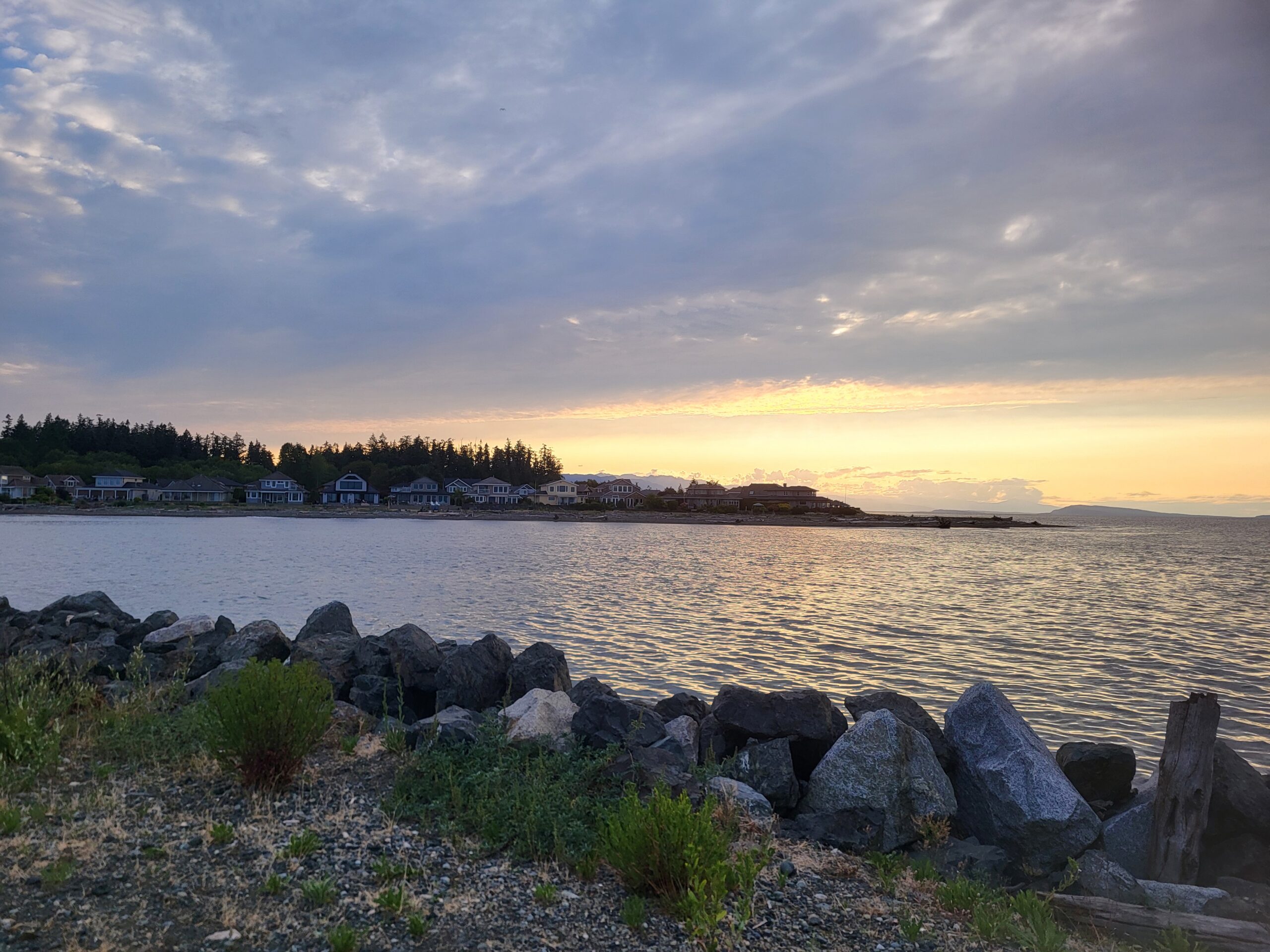 Waterfront homes at sunset